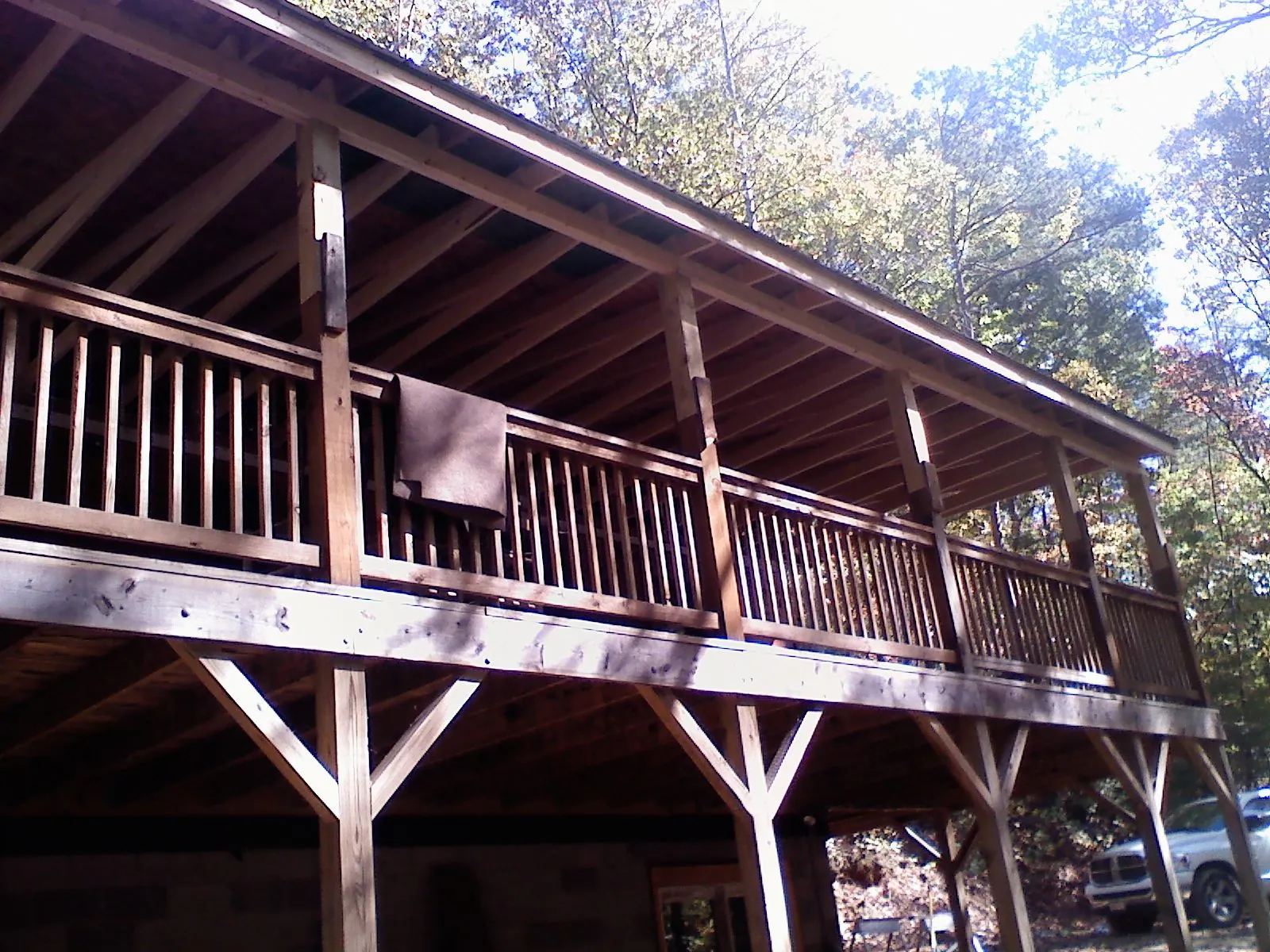 Timber framing under a new elevated porch and deck — Roof Leak Repair in Starkville by Roofing Brothers